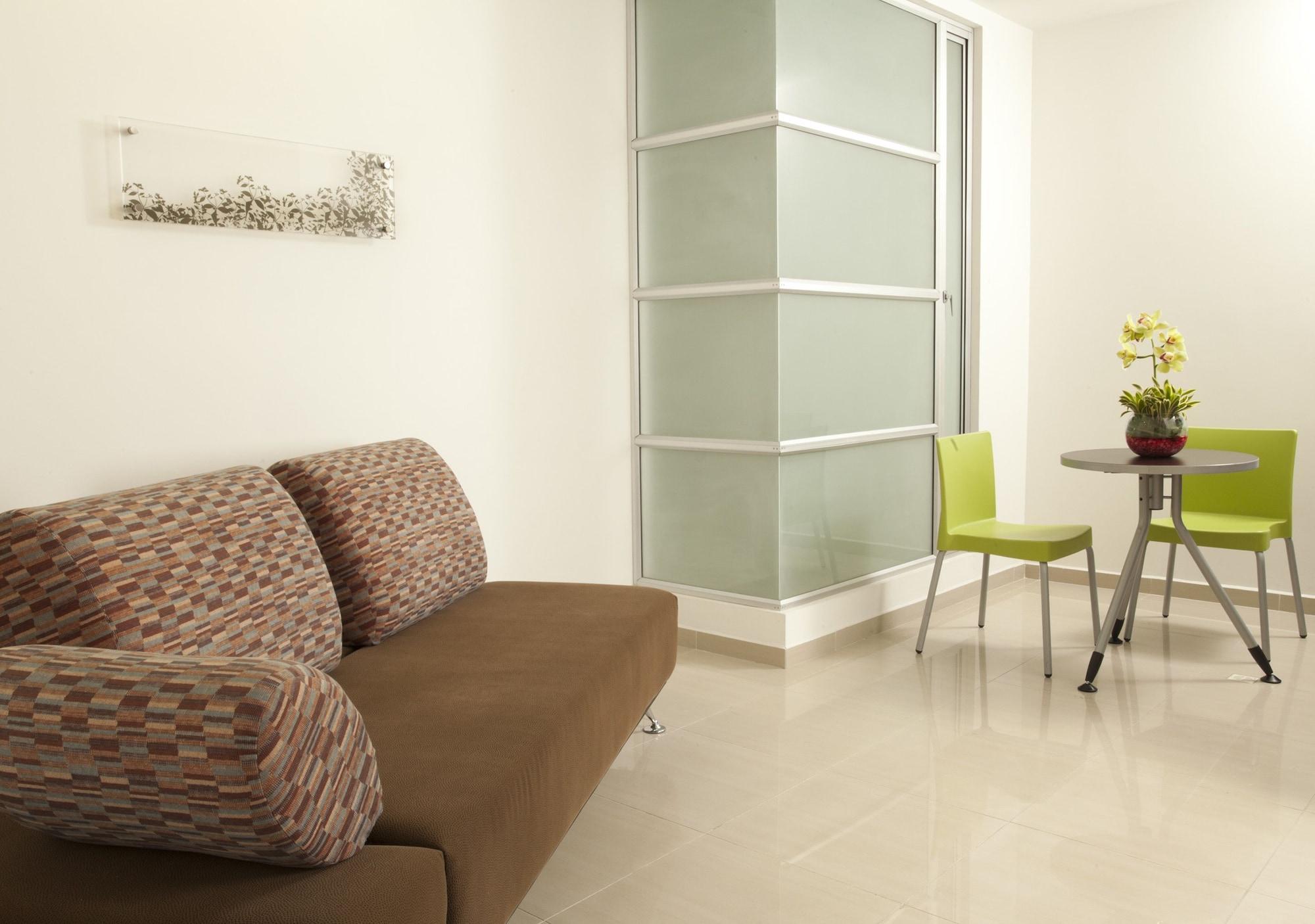 San Simon Hotel Pereira By Soratama Екстер'єр фото A room with a vinyl floor