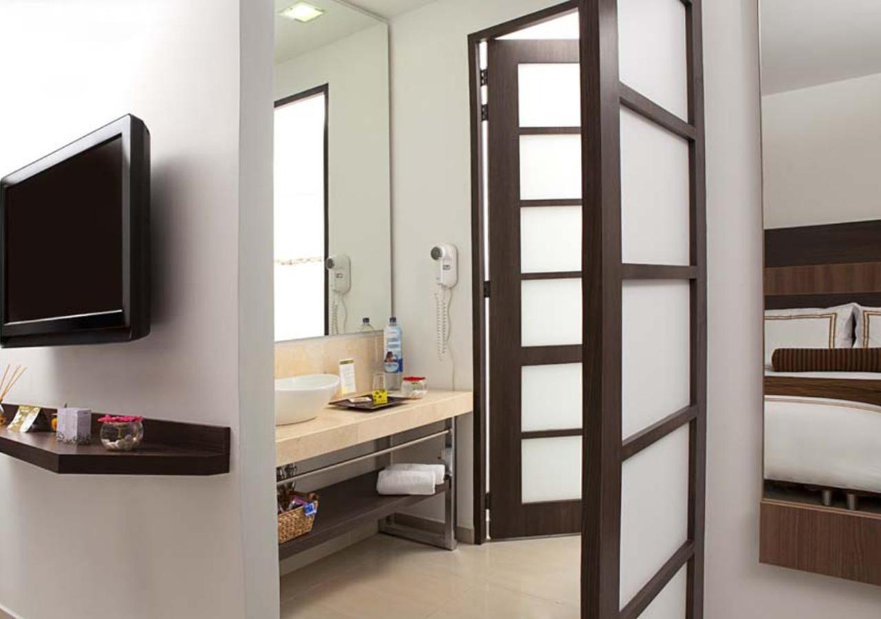San Simon Hotel Pereira By Soratama Екстер'єр фото A room at the hotel